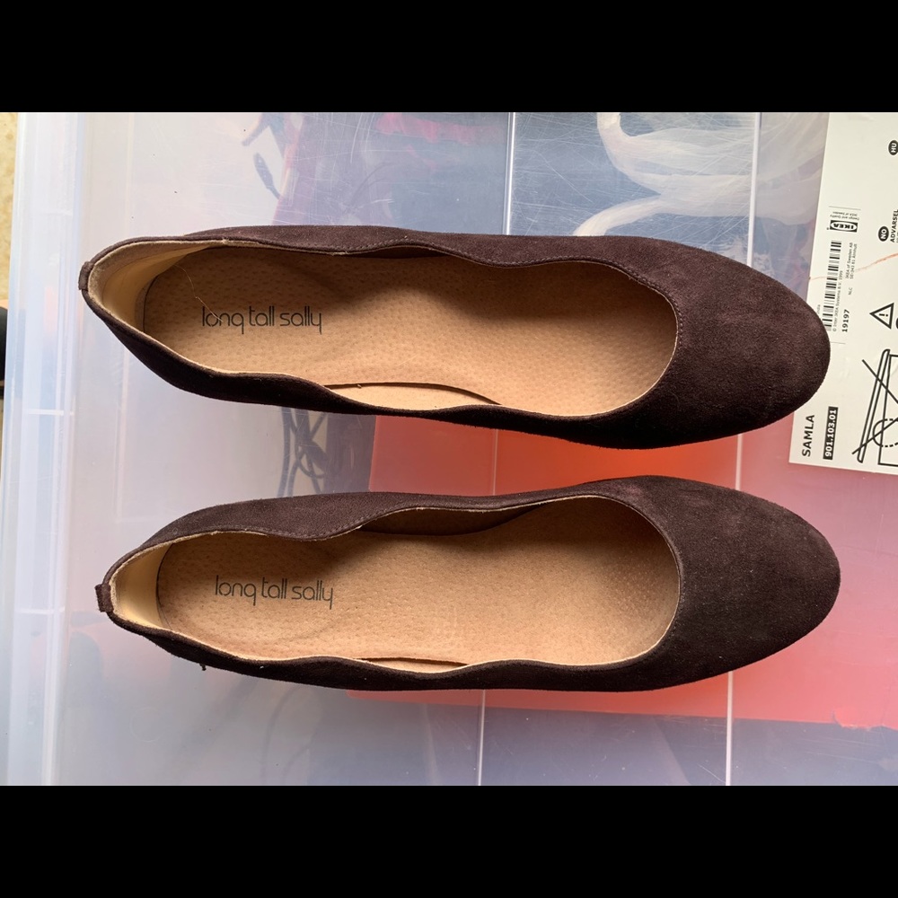 Long Tall Sally women’s Size 12 flats. They are a deep purple burgundy color.